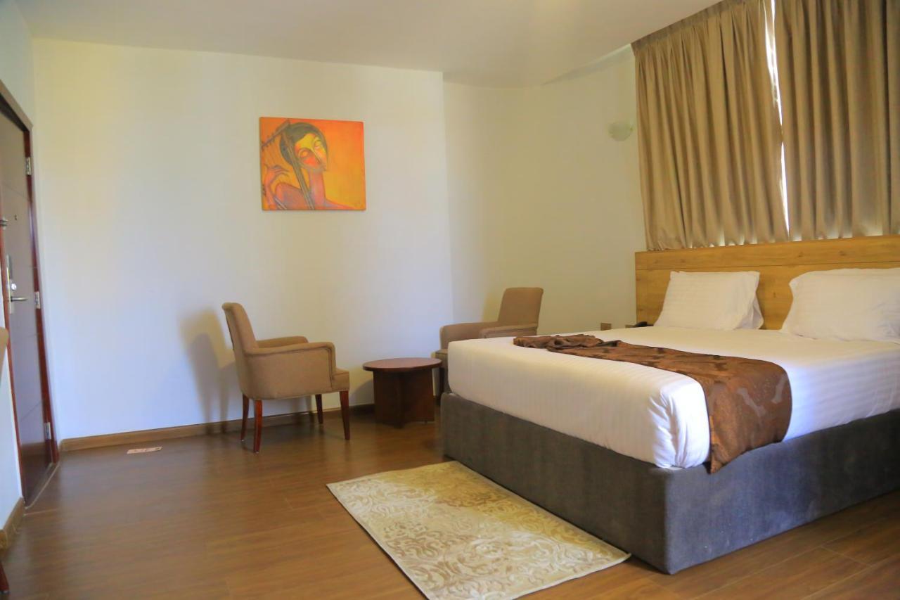 Black Horse Hotel Apartment Addis-Abeba Extérieur photo